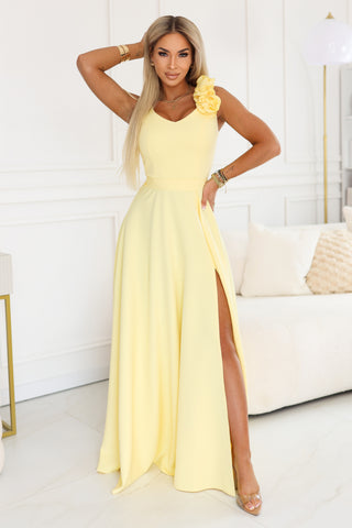 Langes buttergelbes Abendkleid mit Blume, Foto 1