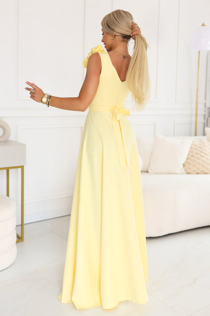 Langes buttergelbes Abendkleid mit Blume, Foto 4