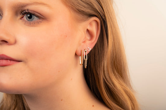 Boucles d'oreilles en V dorées, photo 1