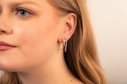 Boucles d'oreilles en V dorées, photo 1