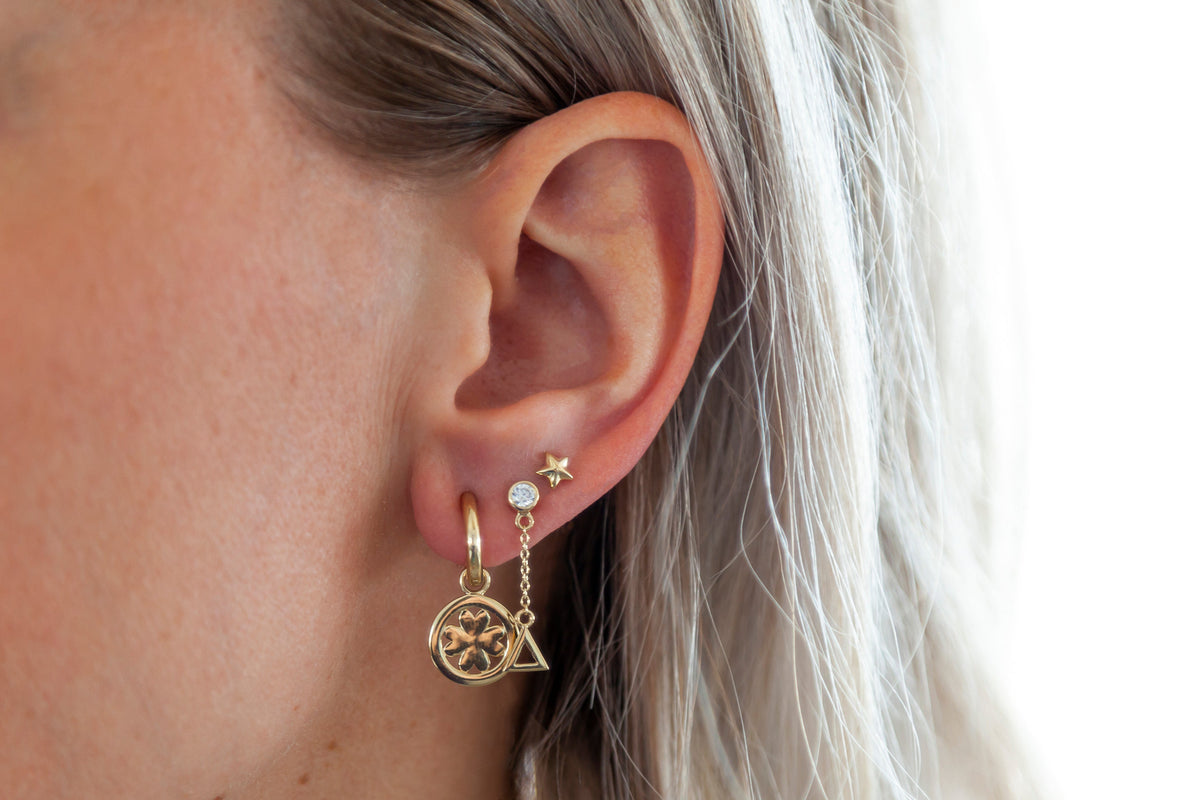 Boucles d'oreilles étoile 3D dorées, photo 3