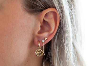 Boucles d'oreilles étoile 3D dorées, photo 3